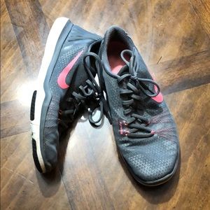 Gray and pink nike training shoes